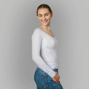Studio photo of female model wearing ANTI-SWEAT SHIRT WOMEN undershirts from ConfidenceForAll